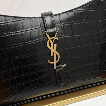YSL LE 5 À 7 in crocodile-embossed shiny leather