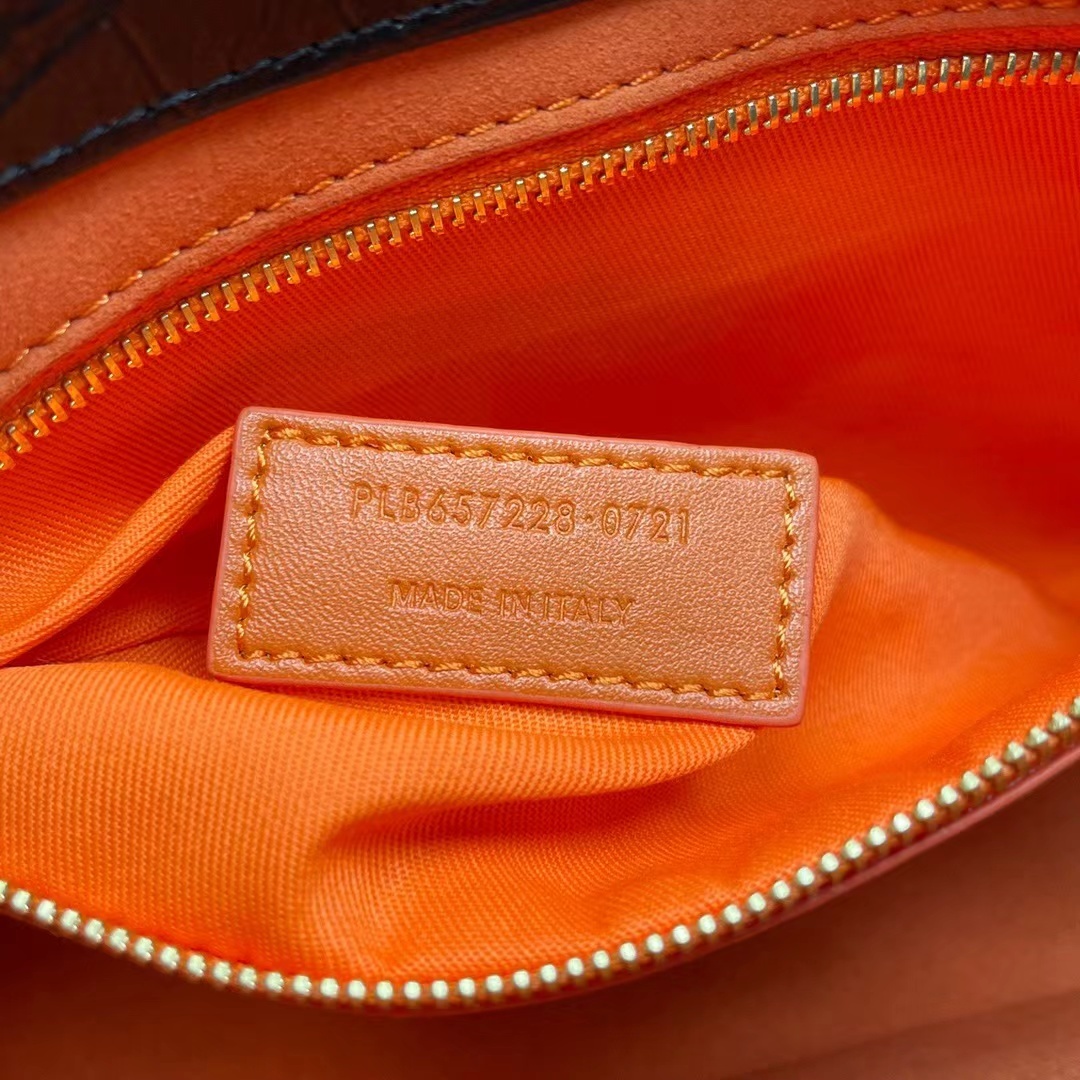 YSL LE 5 À 7 in crocodile-embossed shiny leather