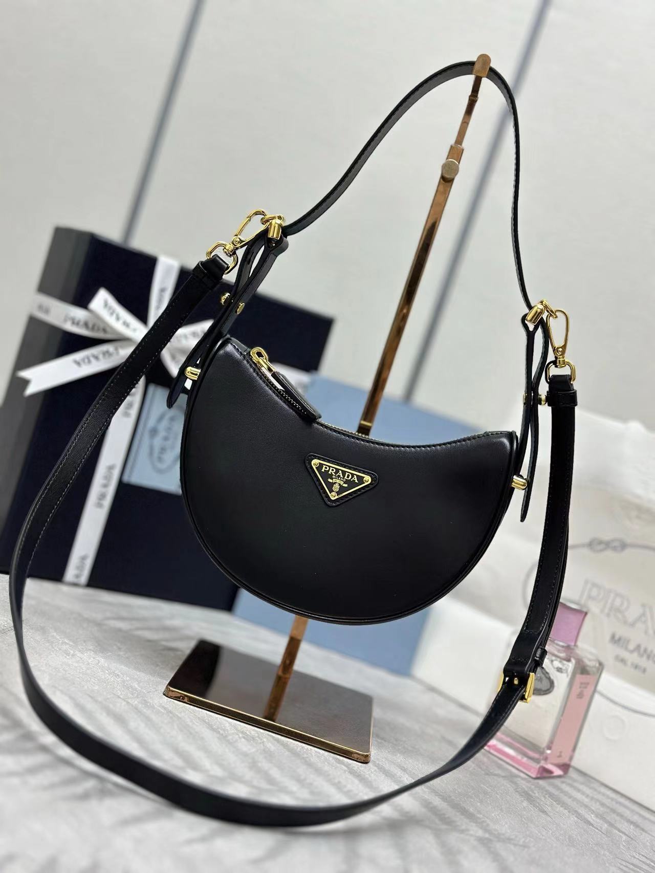 Prada Arqué leather mini shoulder bag