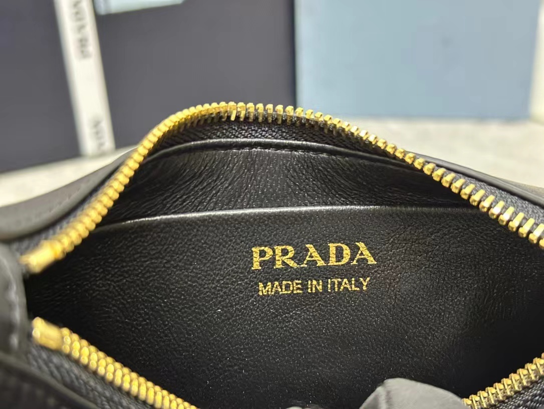 Prada Arqué leather mini shoulder bag