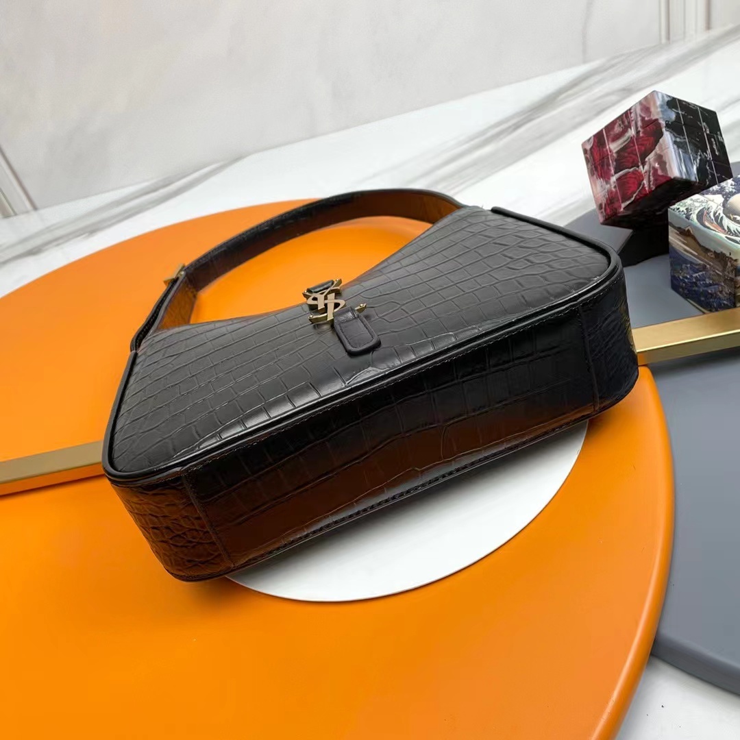 YSL LE 5 À 7 in crocodile-embossed shiny leather