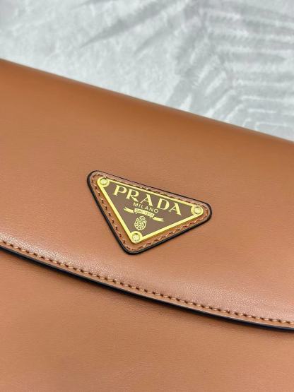 Prada Arqué leather shoulder bag with flap