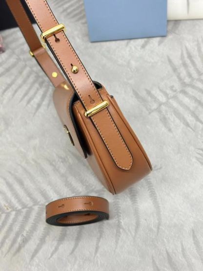 Prada Arqué leather shoulder bag with flap