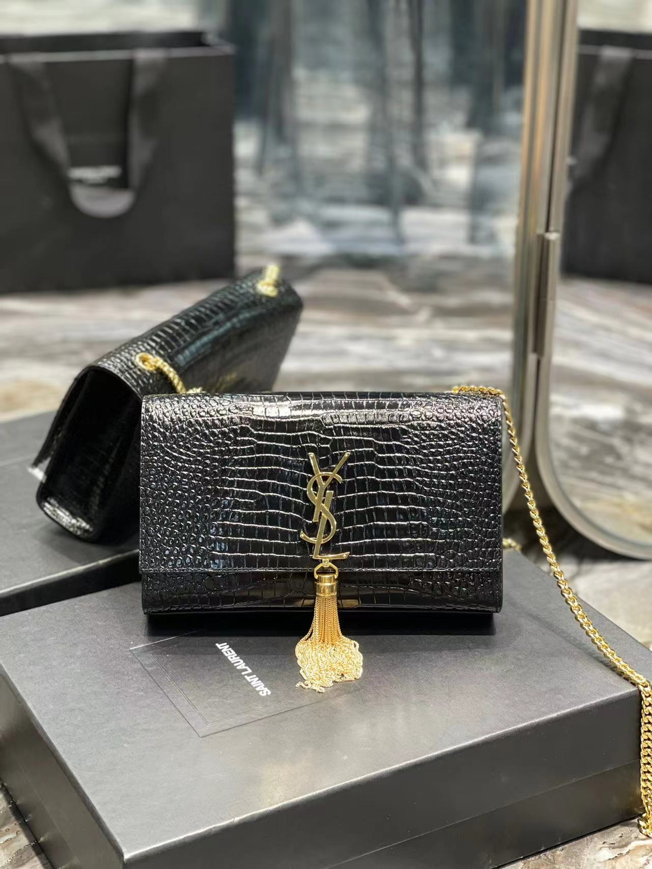 YSL KATE MEDIUM CHAIN BAG WITH TASSEL IN CROCODILE-EMBOSSED SHINY LEATHER