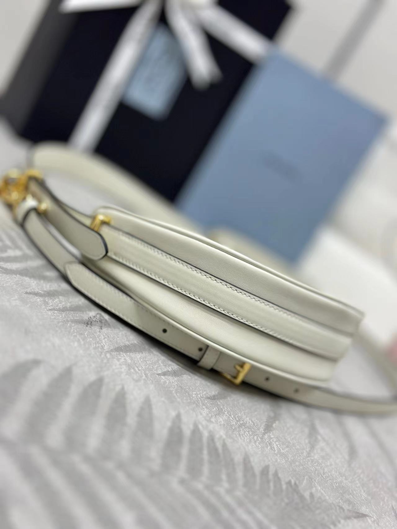 Prada Arqué leather mini shoulder bag
