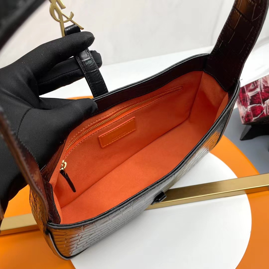 YSL LE 5 À 7 in crocodile-embossed shiny leather