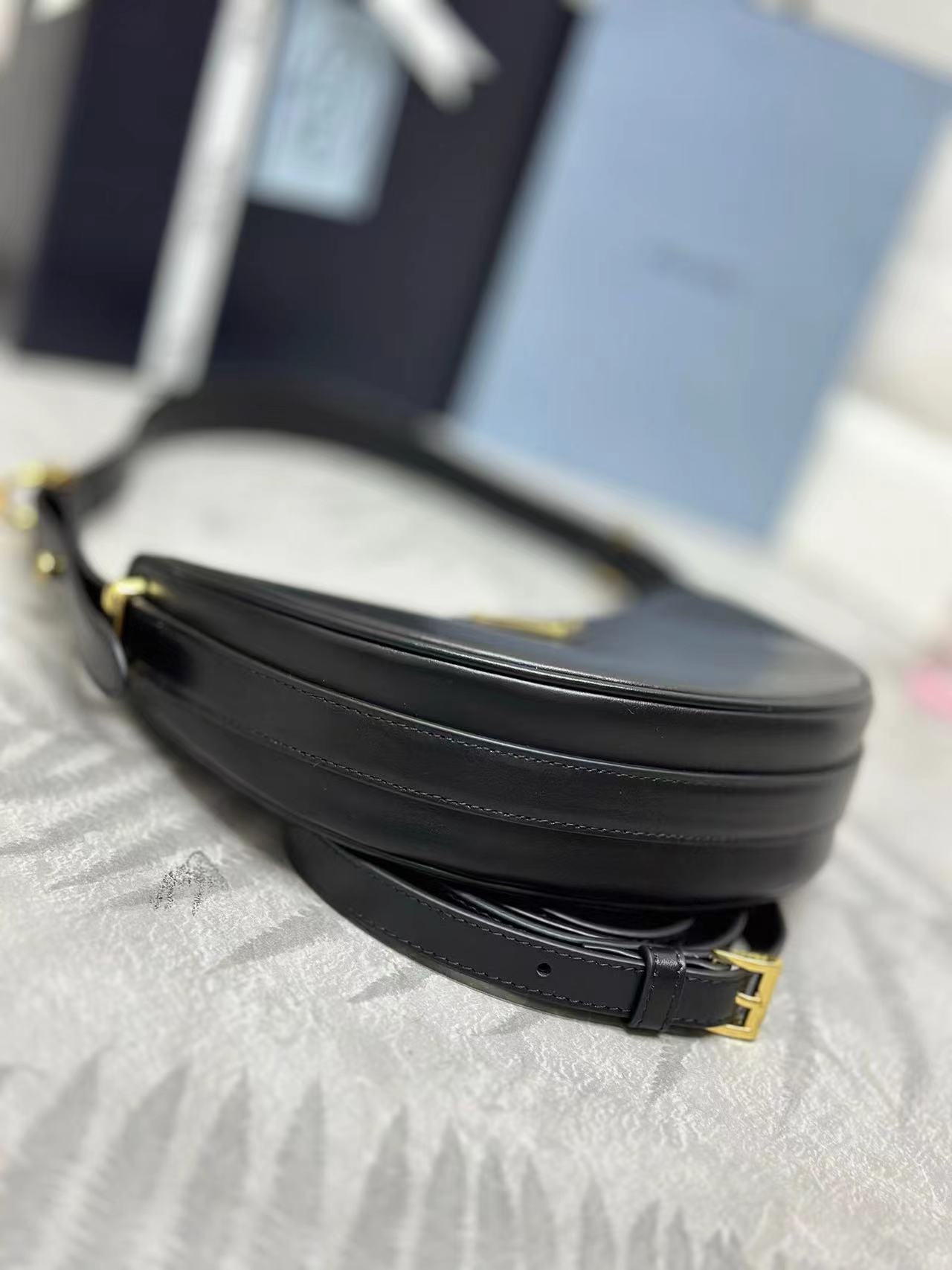 Prada Arqué leather mini shoulder bag