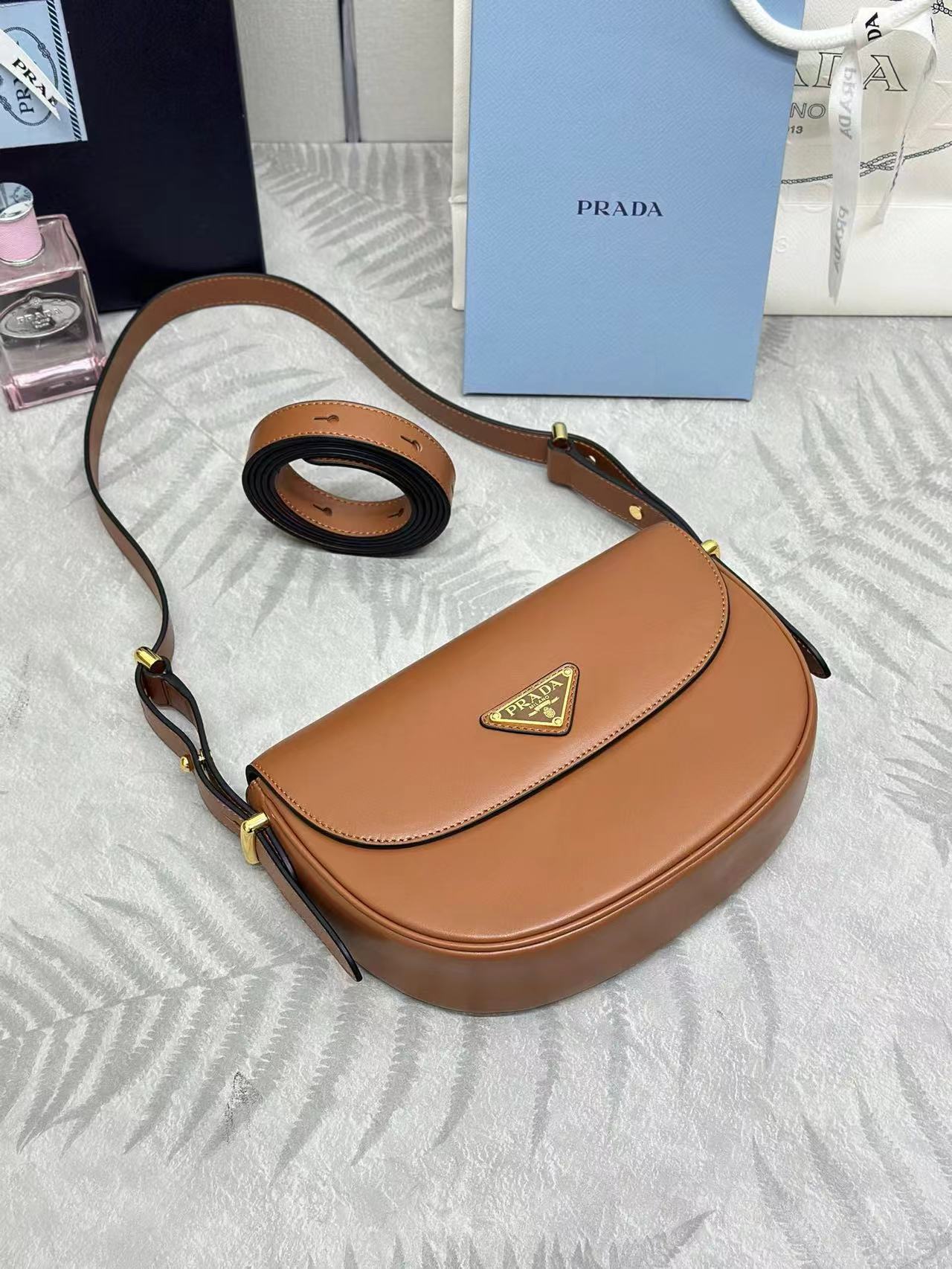 Prada Arqué leather shoulder bag with flap