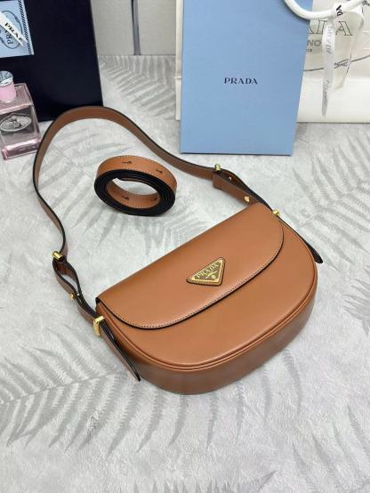 Prada Arqué leather shoulder bag with flap