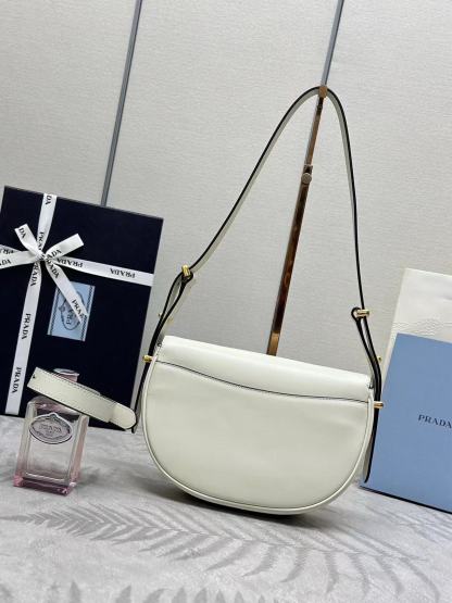 Prada Arqué leather shoulder bag with flap