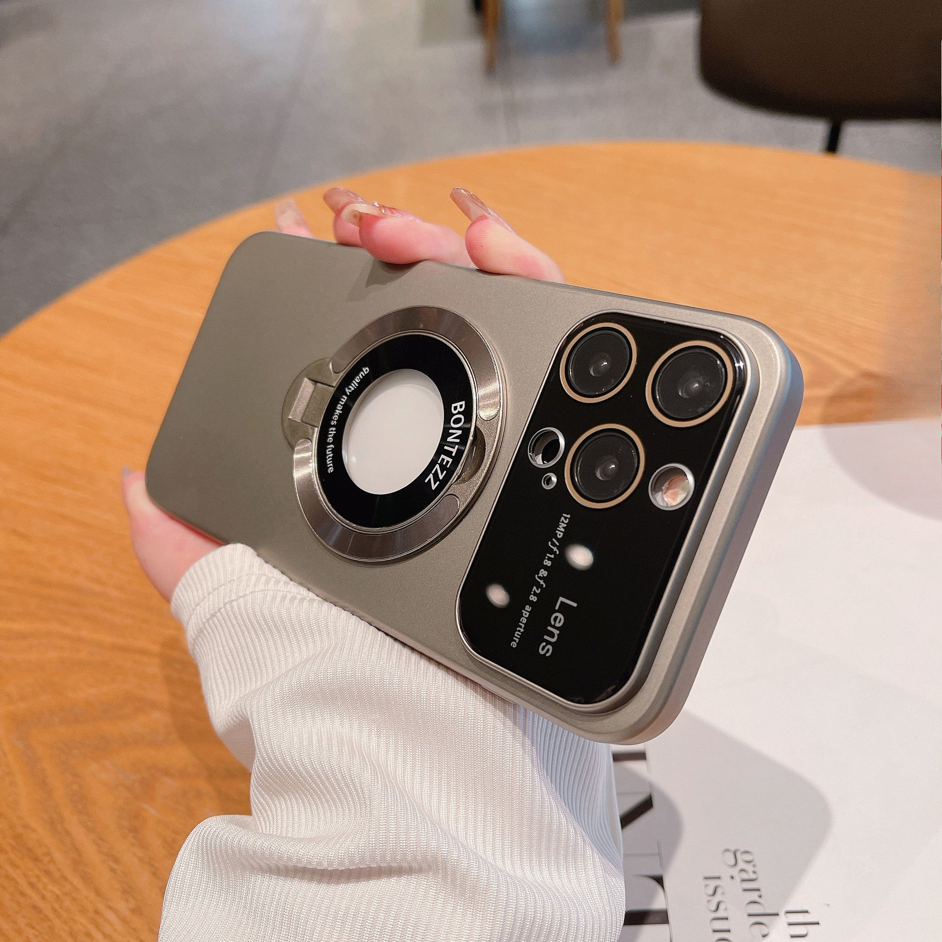 Magnetic bracket large window phone case for iPhone