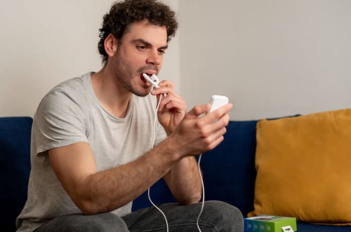 Anti-snoring tongue trainer