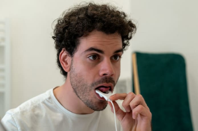 Anti-snoring tongue trainer