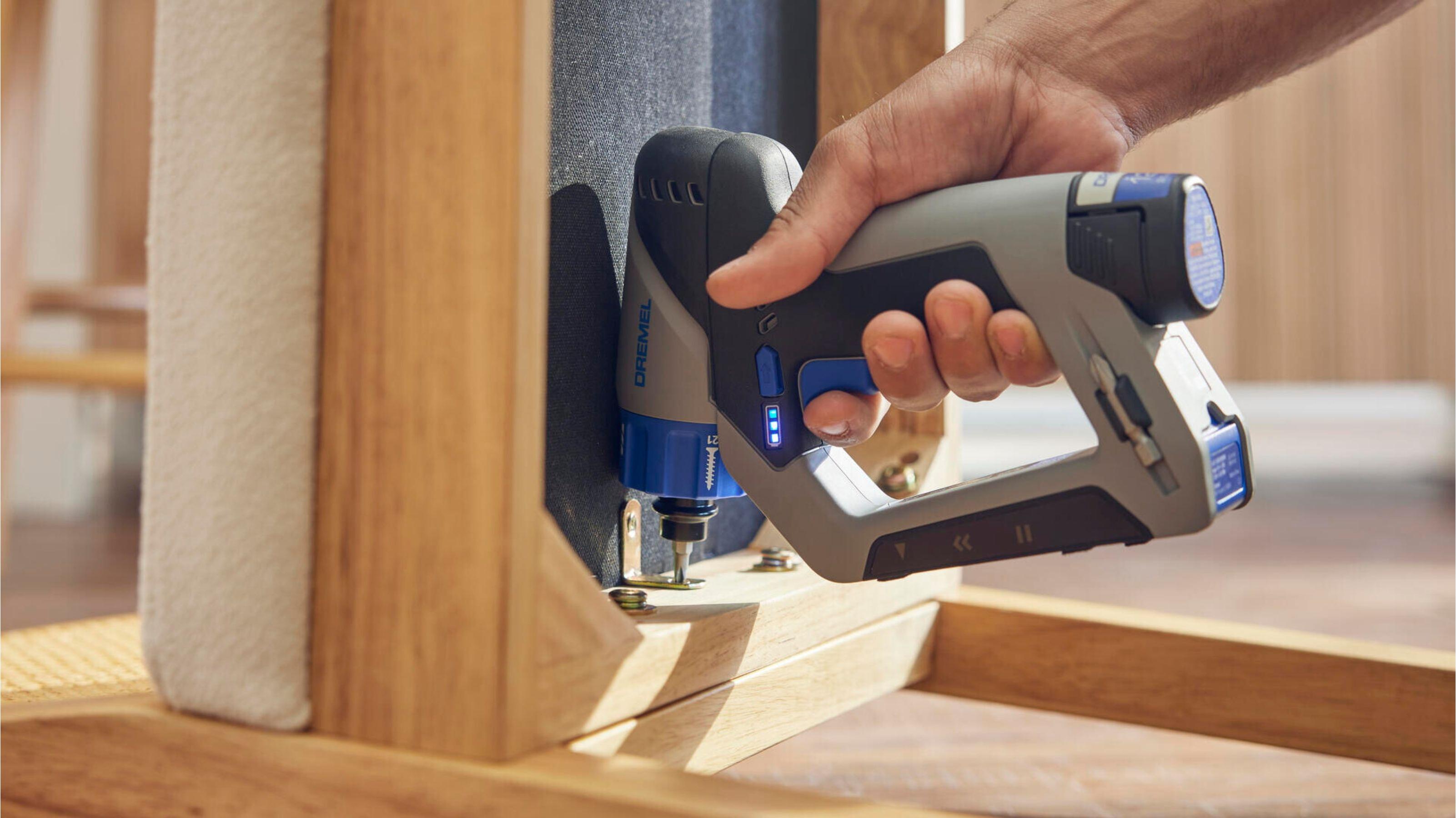 3-in-1 drill with integrated stud finder and removable laser leveler