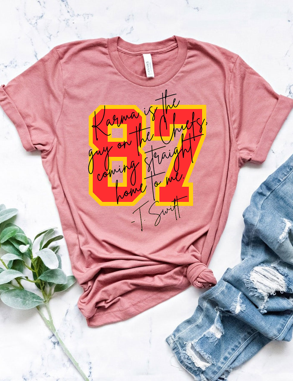 Karma is the guy on the chiefs T-Shirt