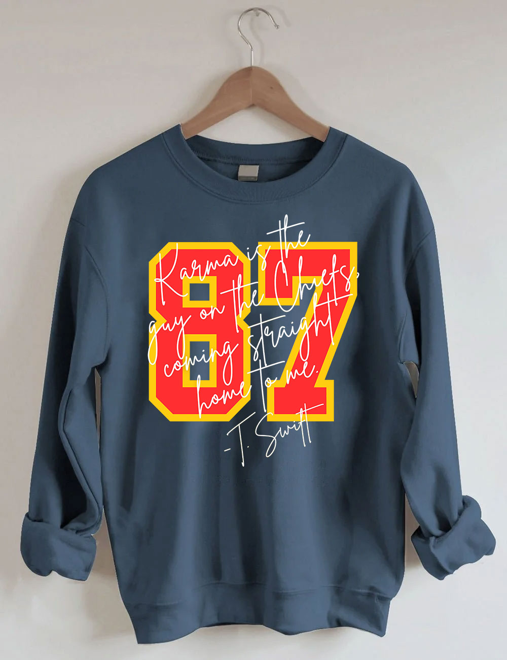Karma is the guy on the chiefs Sweatshirt
