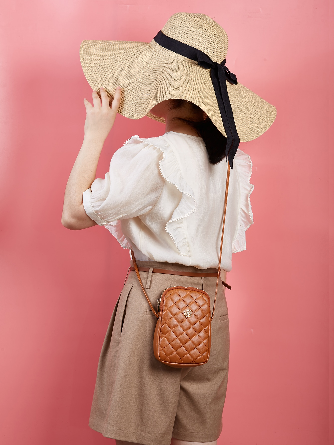 Minimalist quilted metal crossbody bag