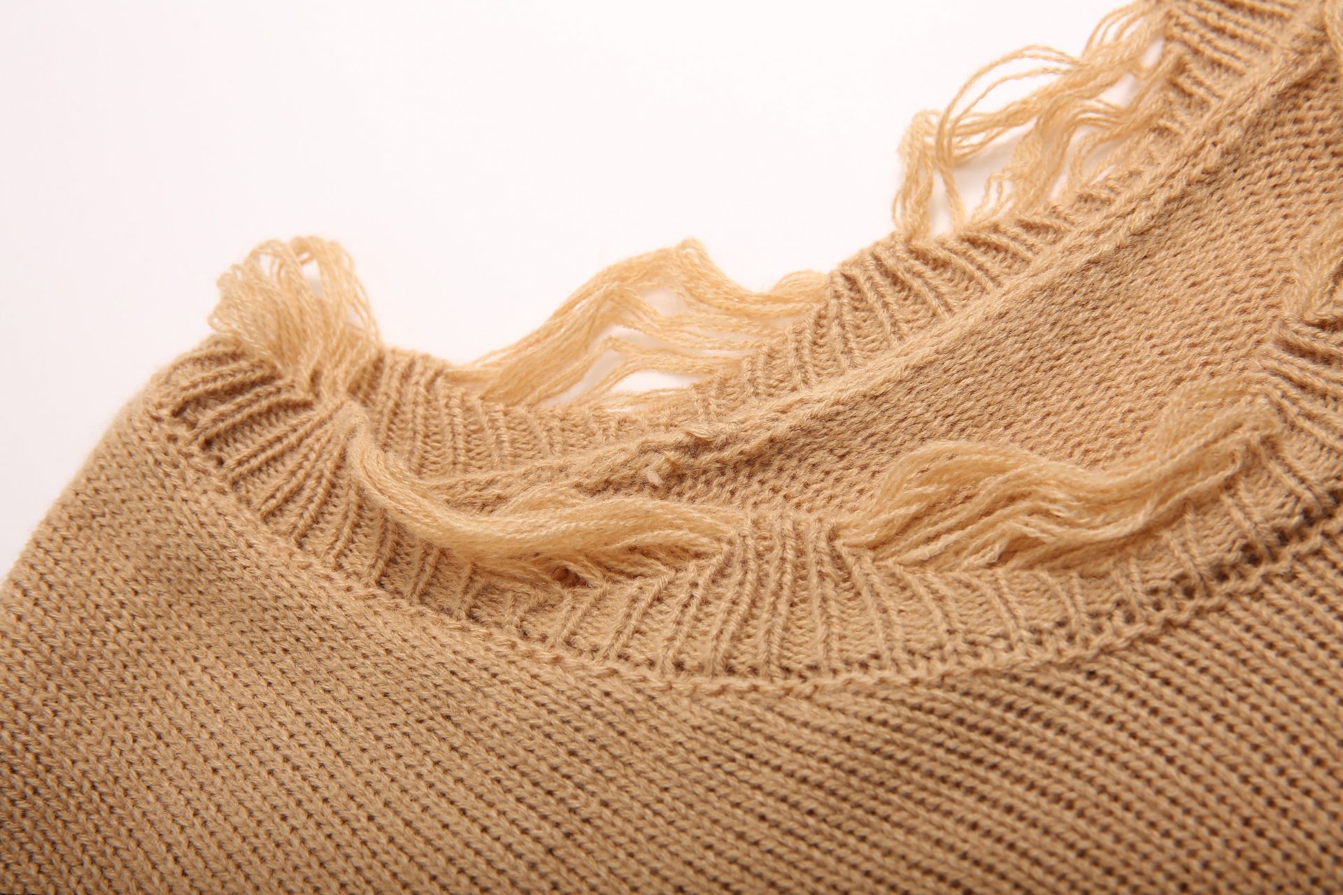 Smiley Knitwear with Distressing Detail