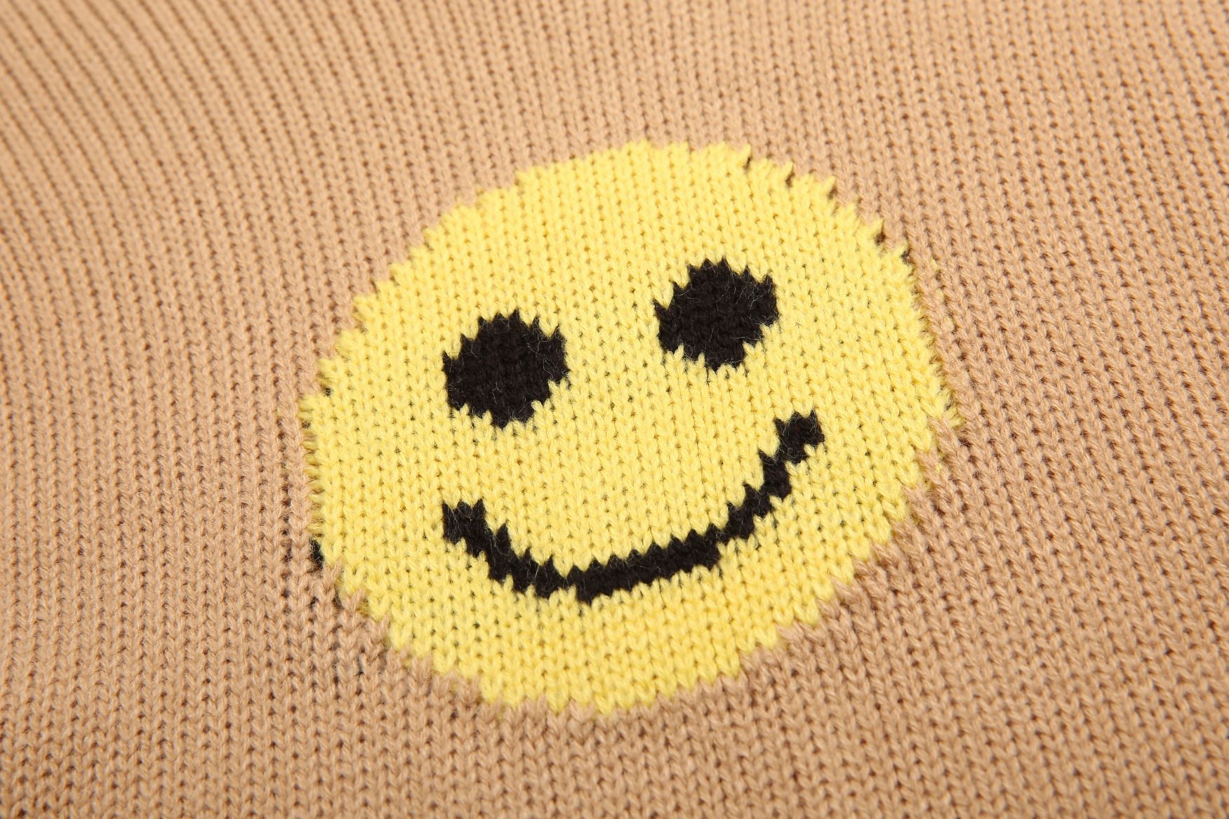 Smiley Knitwear with Distressing Detail