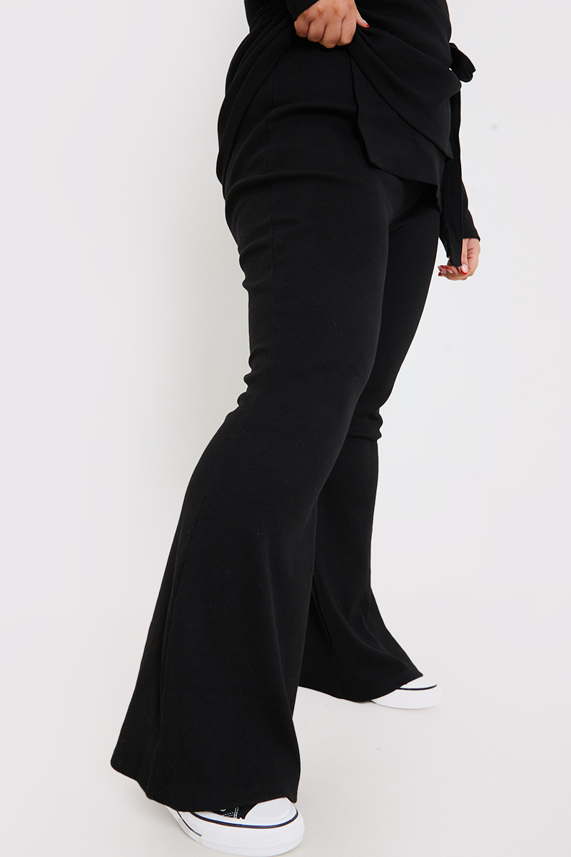 Flared ribbed-knit pants :: LICHI - Online fashion store