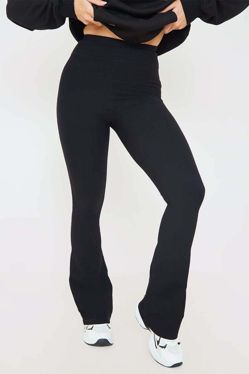 BLACK RIB FIT AND FLARE TROUSERS 