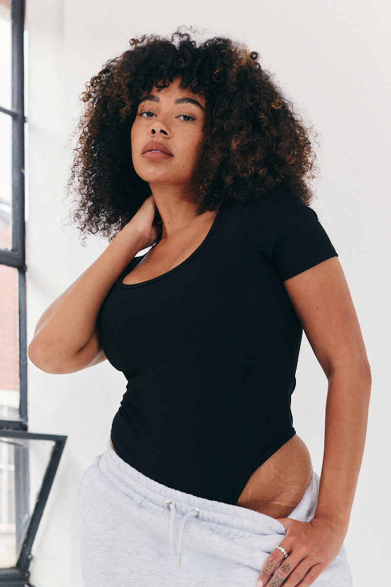 Black sculpting short sleeve bodysuit