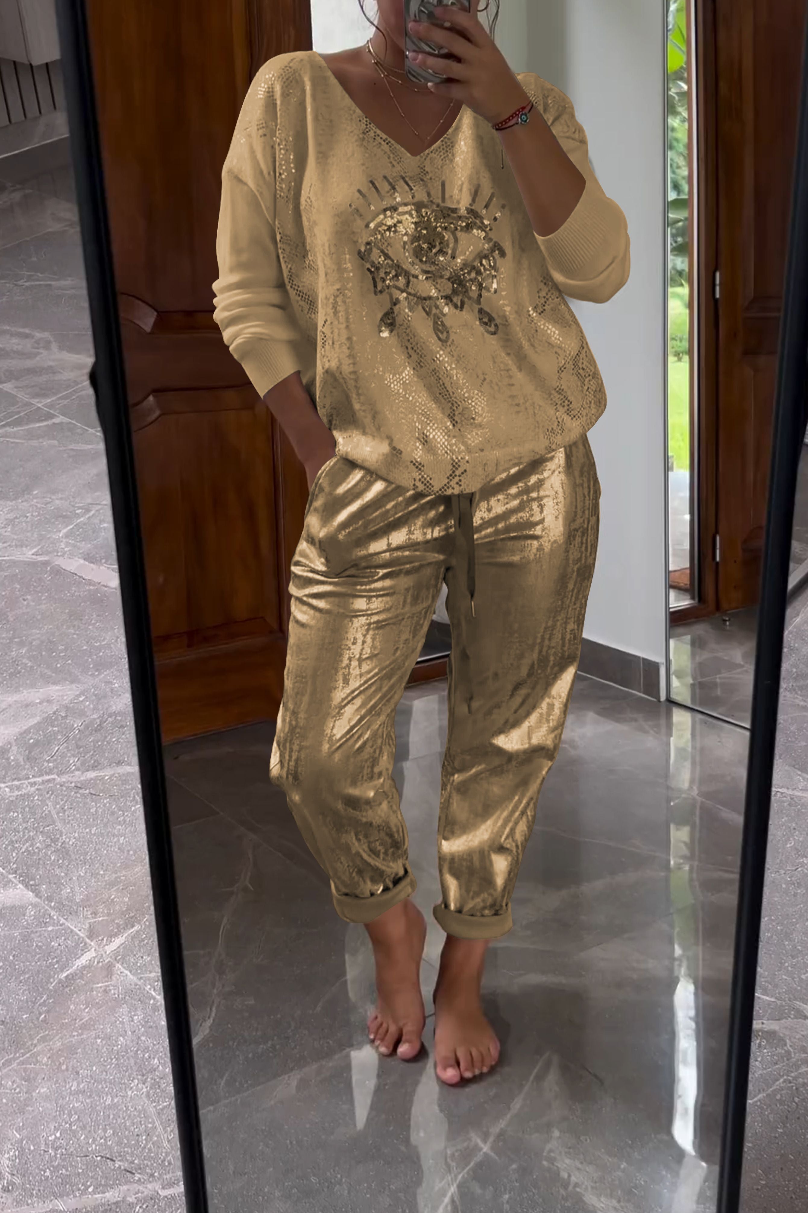 Conjunto de duas peças com top de lantejoulas e calça bronze da moda