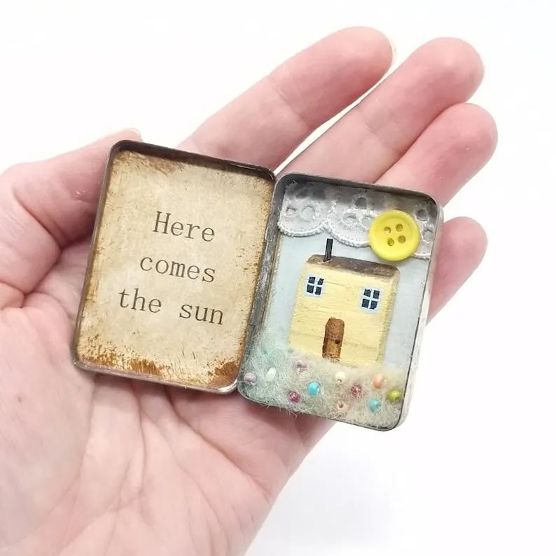 Miniature Wooden House Scene In A Vintage Tin