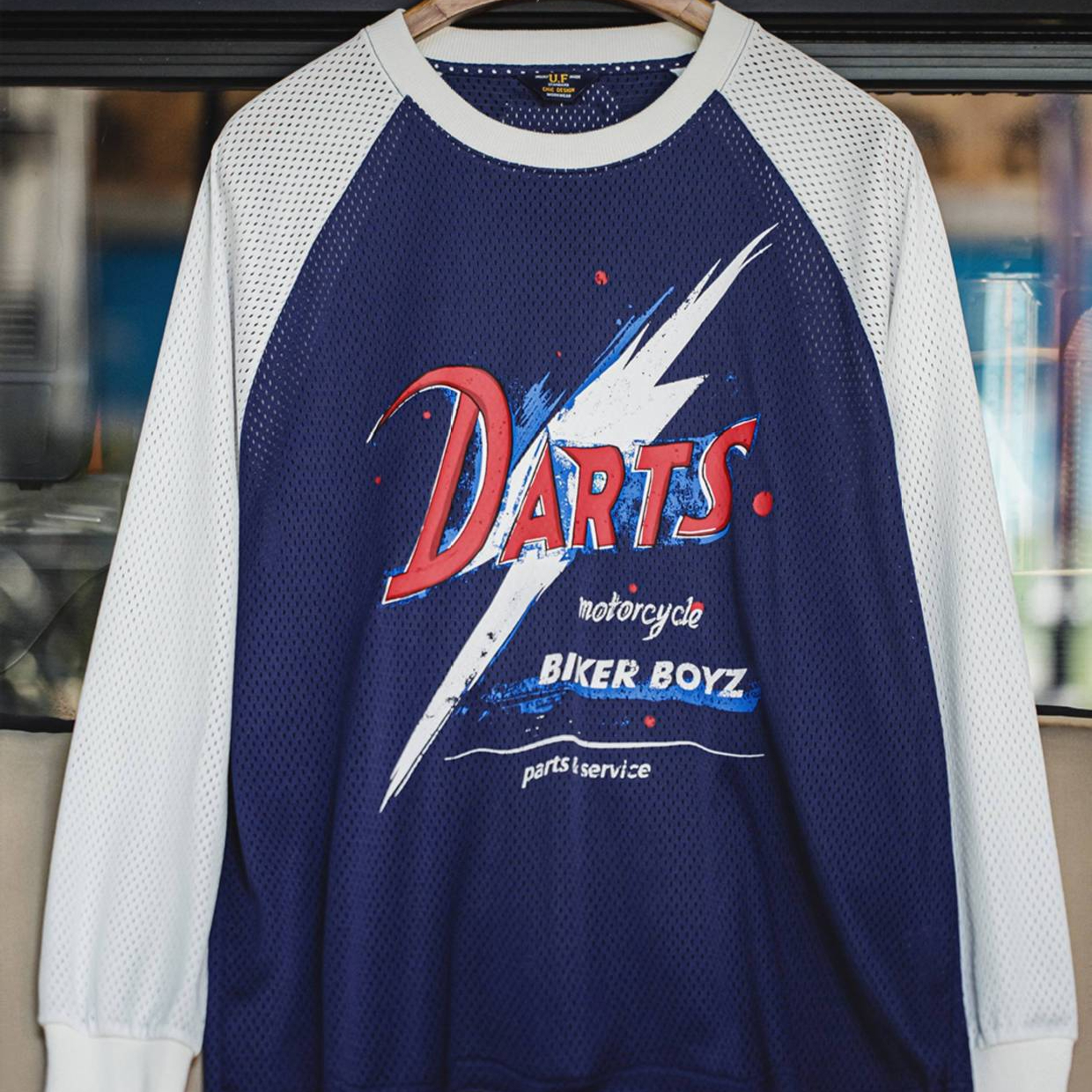 American printed hollow out contrasting knit raglan sleeve long sleeved T-shirt