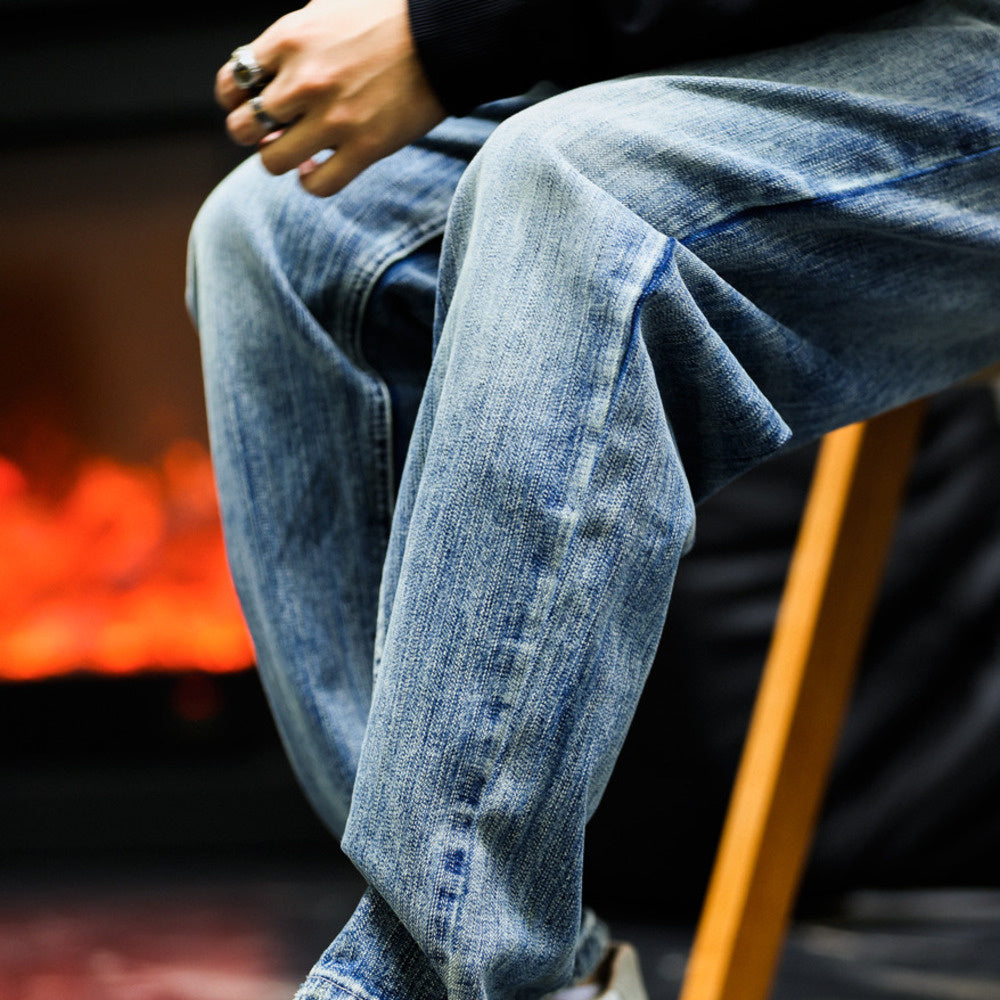 Damaged washed blue jeans men's loose slightly tapered casual drop pants