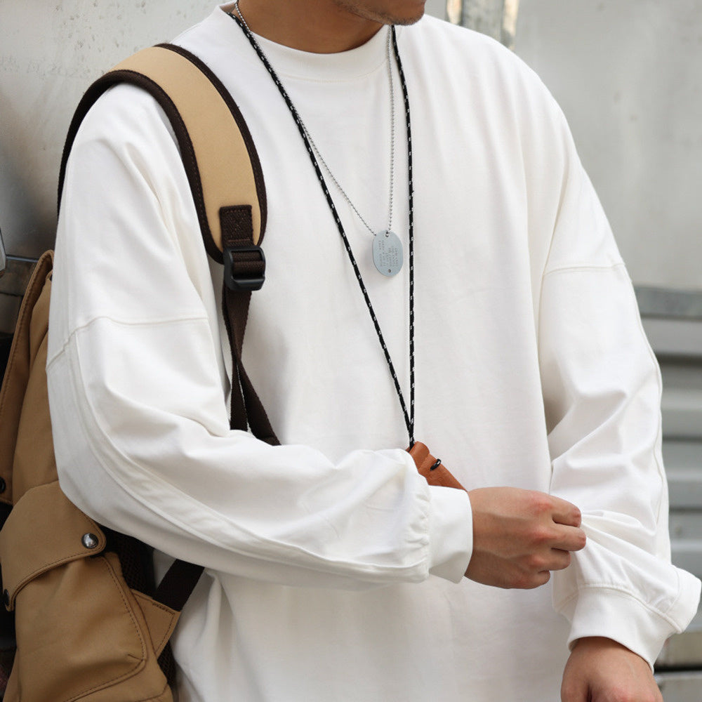 290g long sleeved T-shirt with line splicing sleeve cage, loose solid color round neck casual base shirt