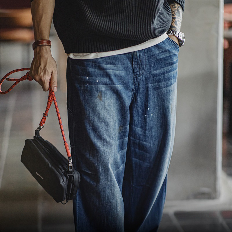 Maden vintage distressed white cat whiskers loose washed denim splashed ink straight leg jeans