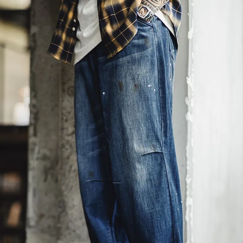 Maden vintage distressed white cat whiskers loose washed denim splashed ink straight leg jeans