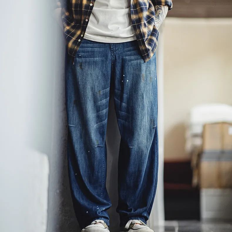 Maden vintage distressed white cat whiskers loose washed denim splashed ink straight leg jeans