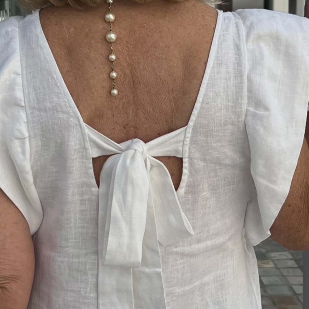 Elegante vestido de algodón y lino con cuello en V y color liso