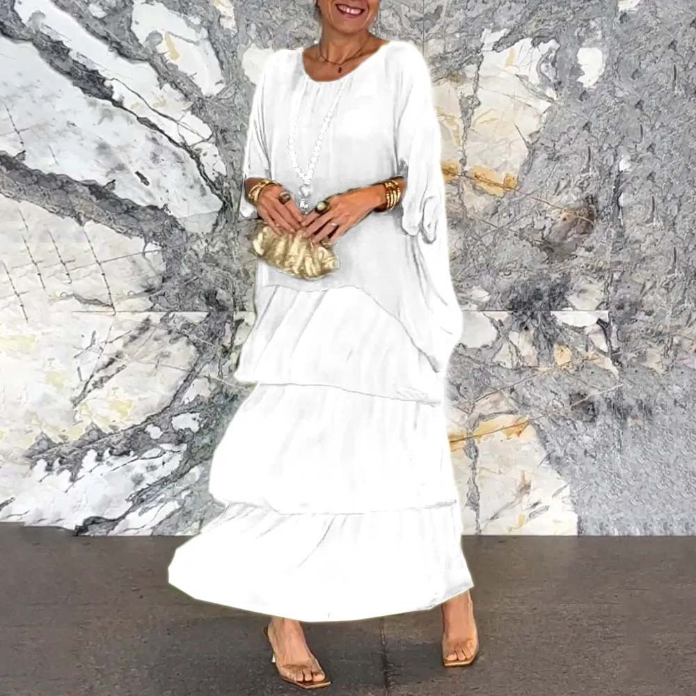 Elegante vestido suelto con cuello redondo y manga murciélago