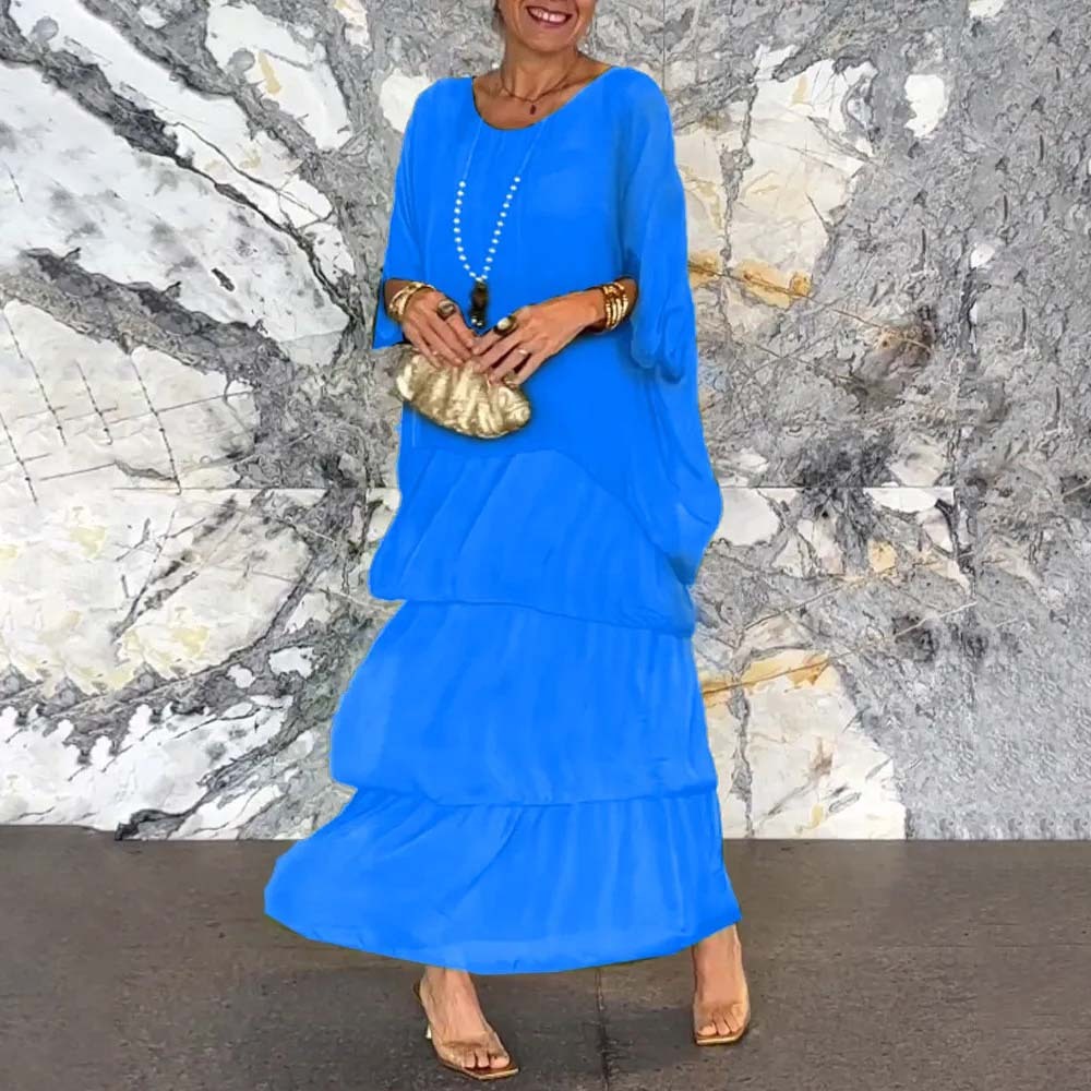 Elegante vestido suelto con cuello redondo y manga murciélago