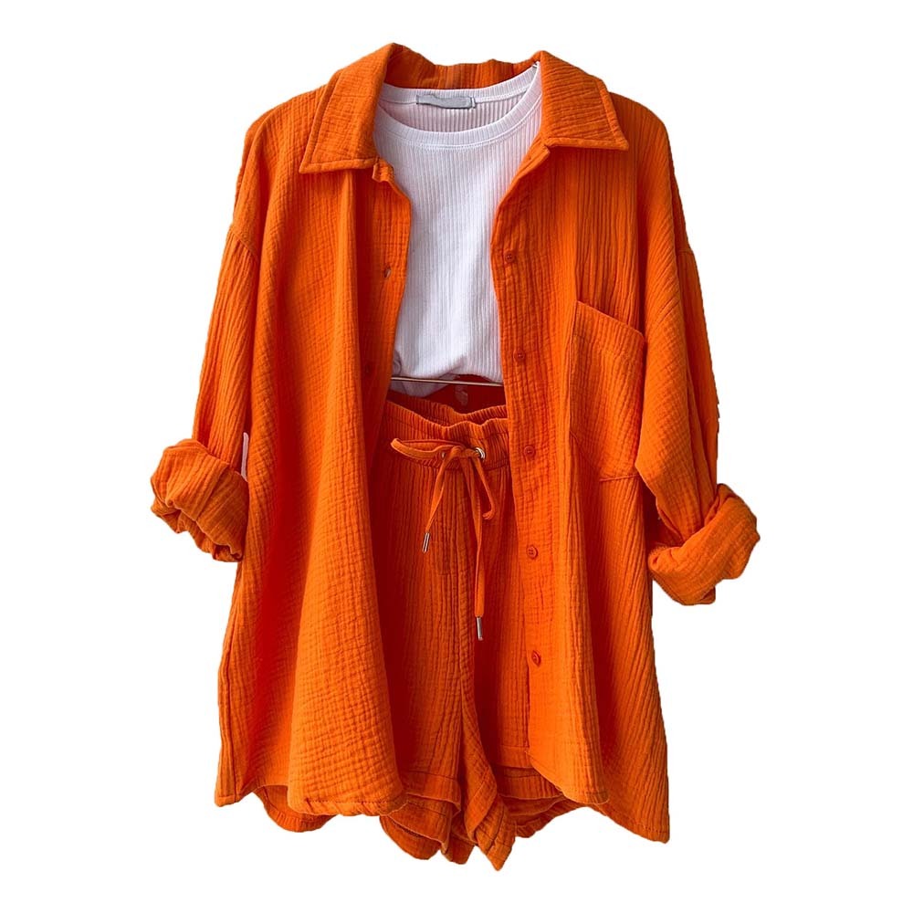 Traje de mujer (camisa de manga larga + pantalón corto)