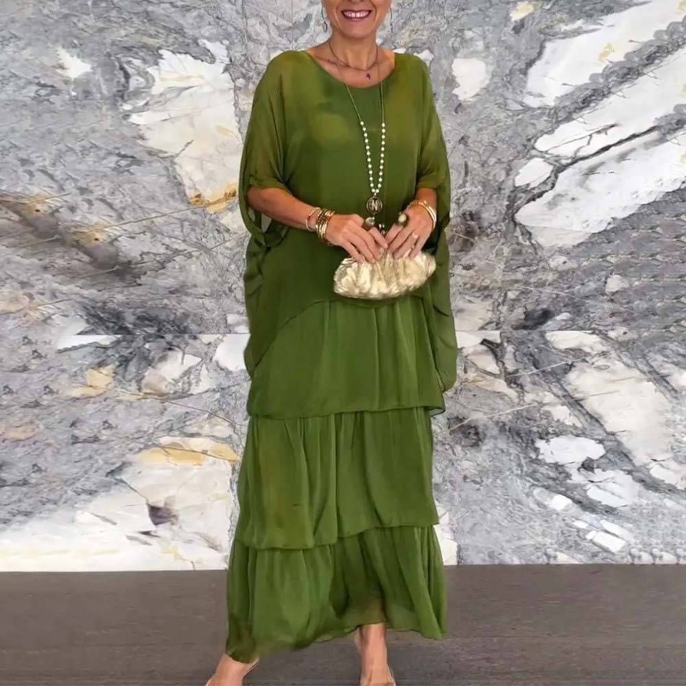 Elegante vestido suelto con cuello redondo y manga murciélago