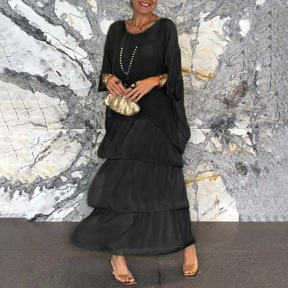 Elegante vestido suelto con cuello redondo y manga murciélago