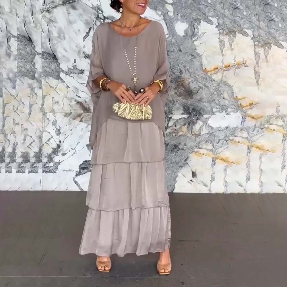 Elegante vestido suelto con cuello redondo y manga murciélago