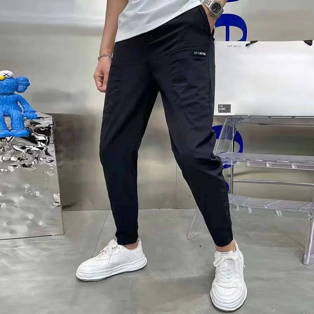 Mono ajustado de hombre de gran elasticidad con múltiples bolsillos