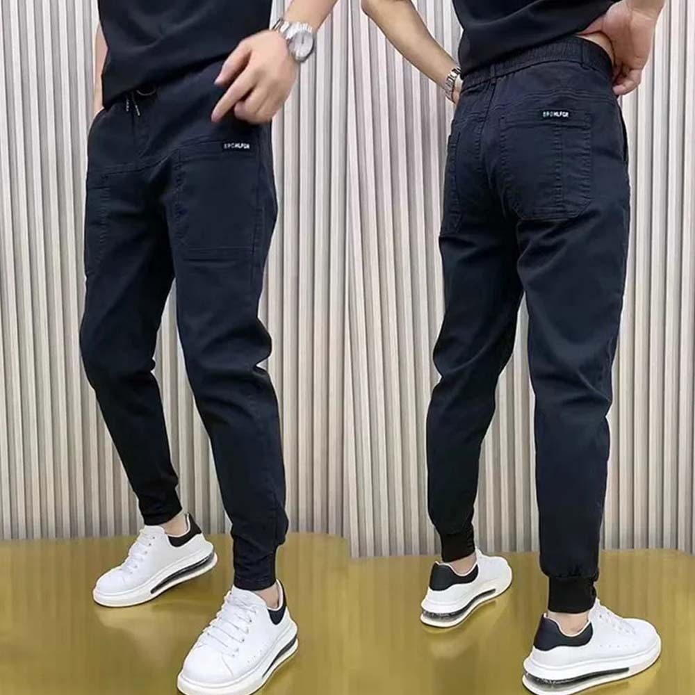 Mono ajustado de hombre de gran elasticidad con múltiples bolsillos