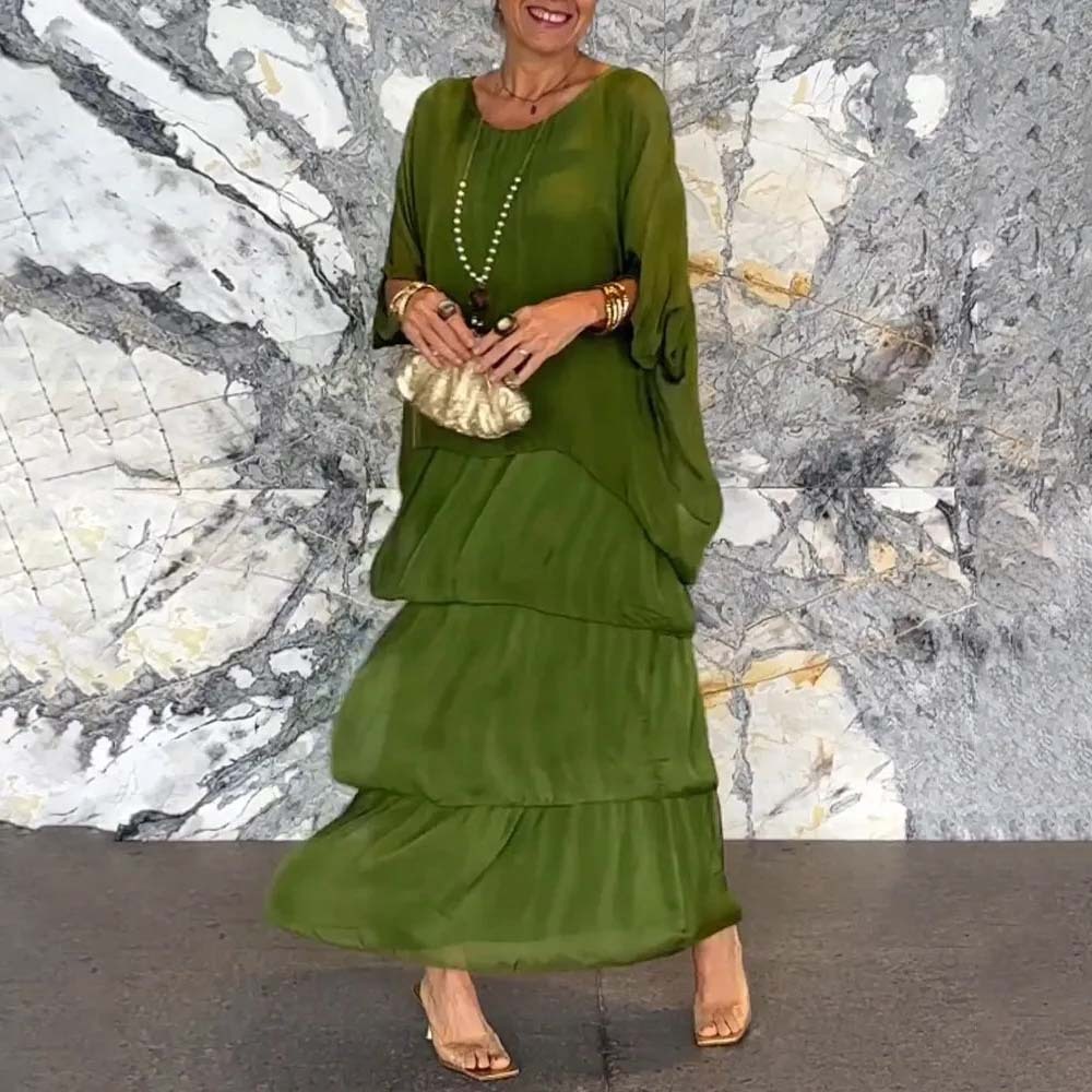 Elegante vestido suelto con cuello redondo y manga murciélago