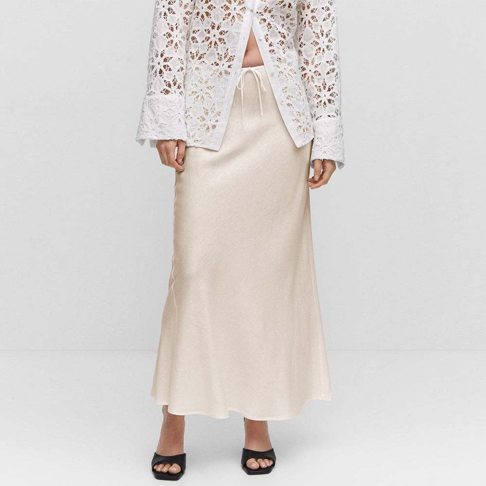 Falda de mujer elegante de satén con tirantes y talle alto