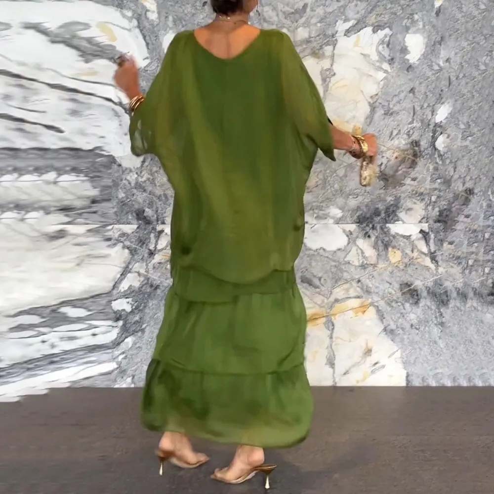 Elegante vestido suelto con cuello redondo y manga murciélago