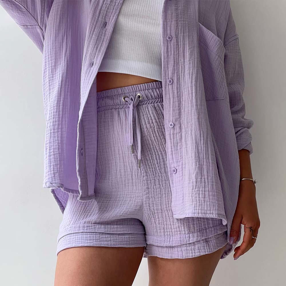 Traje de mujer (camisa de manga larga + pantalón corto)