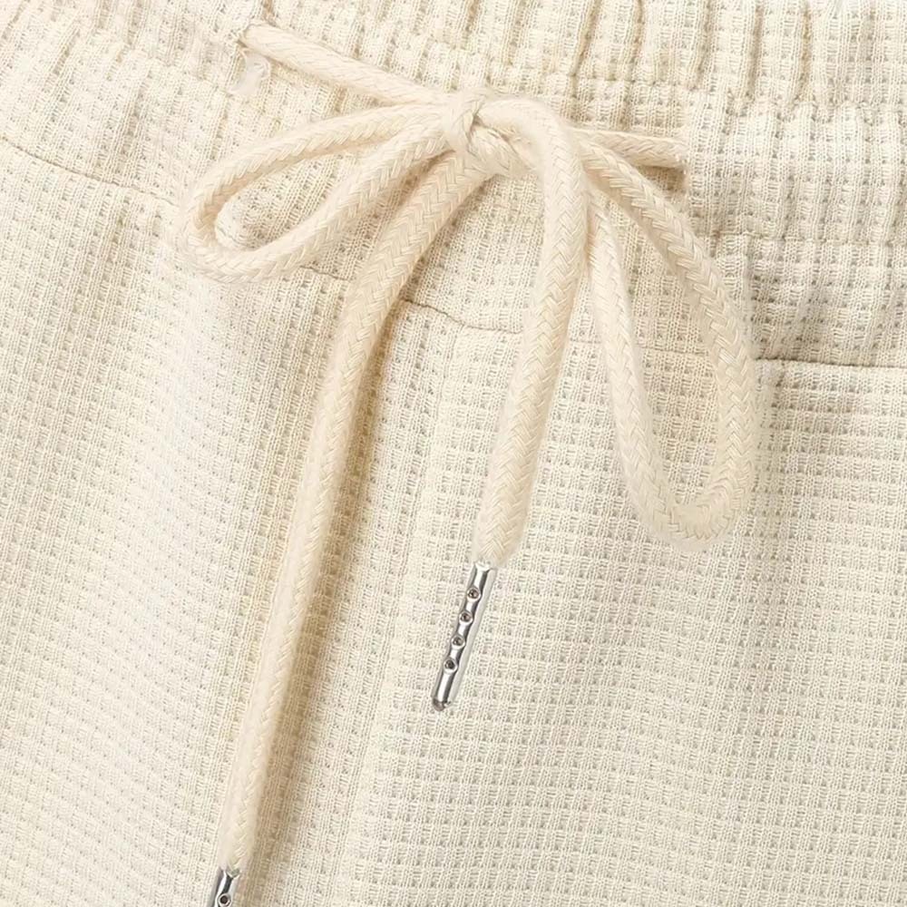 2024 nuevos pantalones de jogging de pie pequeño a cuadros tipo gofre para hombres