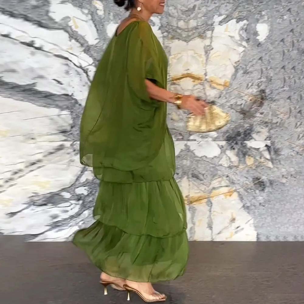 Elegante vestido suelto con cuello redondo y manga murciélago