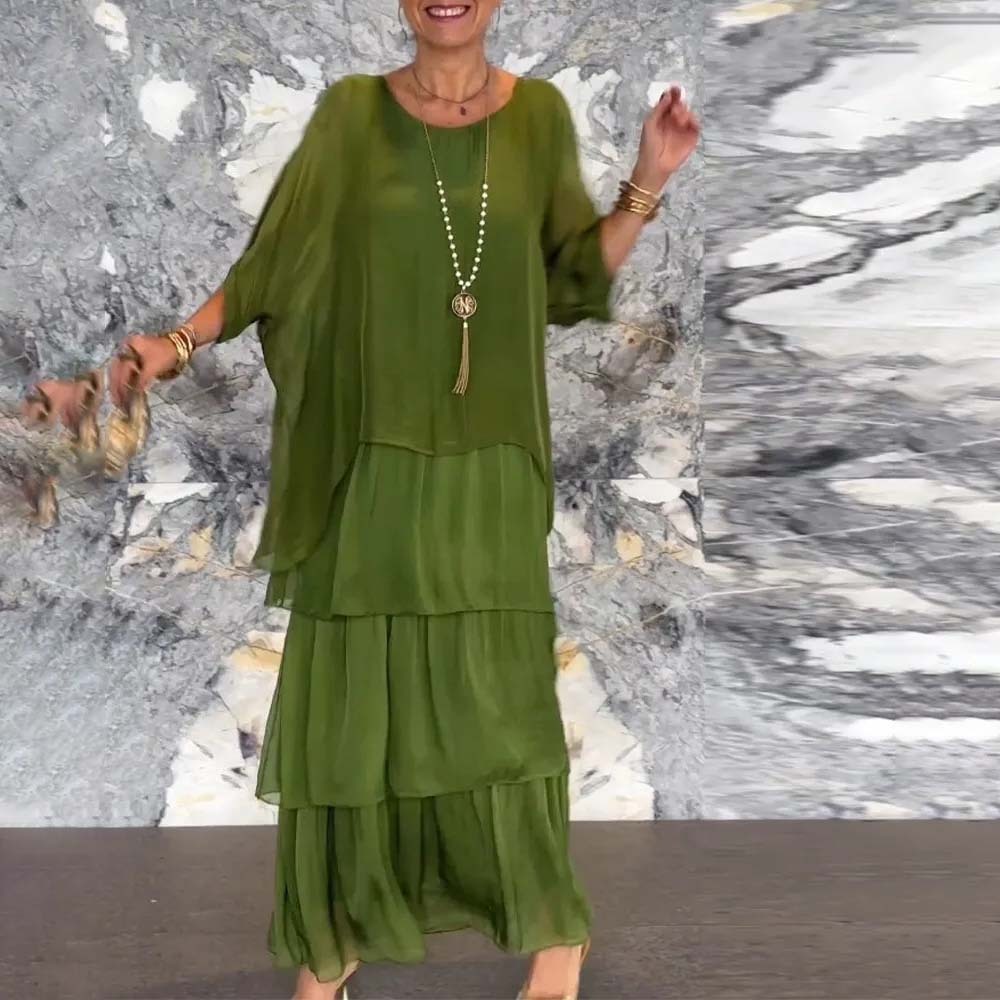 Elegante vestido suelto con cuello redondo y manga murciélago